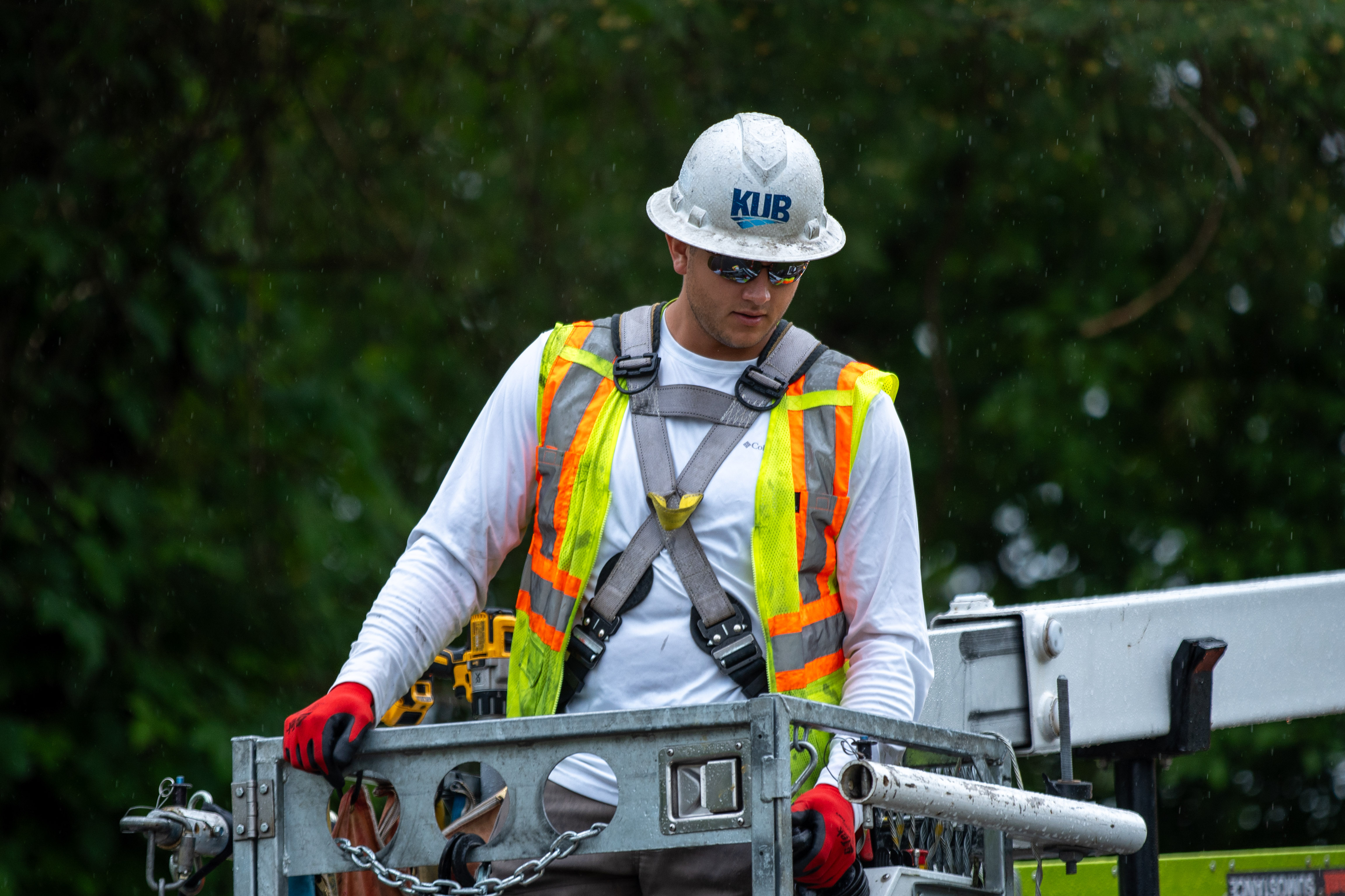 Fiber Construction is underway. KUB team member working on it in a bucket truck